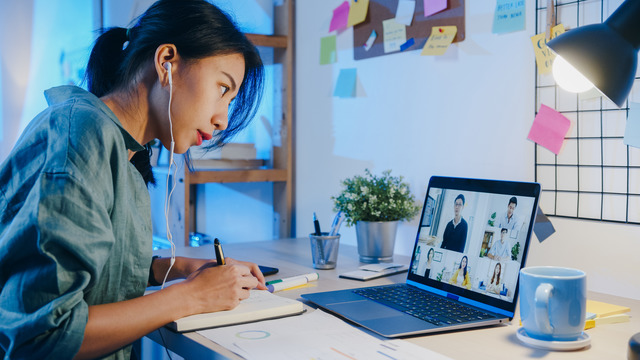 Women writing notes to have clear goals and objectives